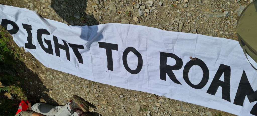 The Right to Roam banner spread across a private track